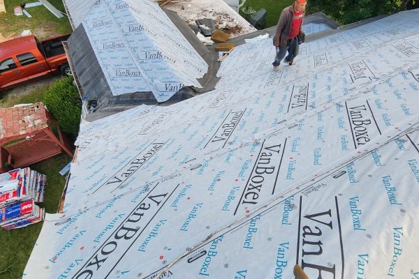 Quality roof replacement in Urbana OH showing new underlayment on home